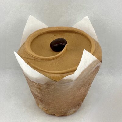 Baked & Wired Vanilla cupcake blended with chai spices and topped with espresso buttercream frosting.
