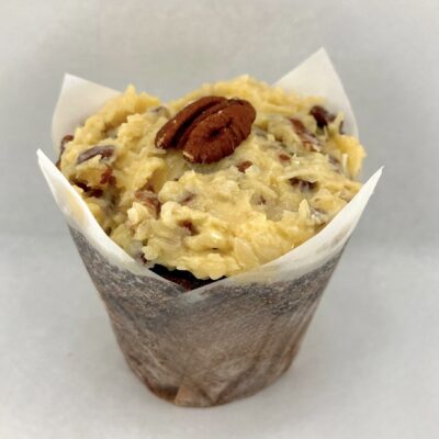 Light chocolate cupcake topped with gooey coconut pecan frosting.