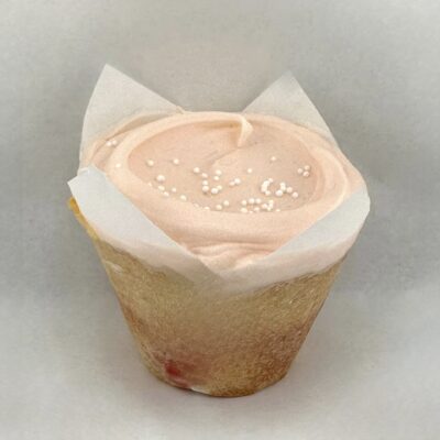 Baked and Wired Vanilla strawberry cupcake with fresh strawberries folded in the batter finished with a swirl of pink buttercream.