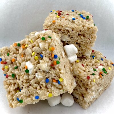 Chewy Rice Krispie treat from Baked & Wired topped with sprinkles and marshmallow pieces