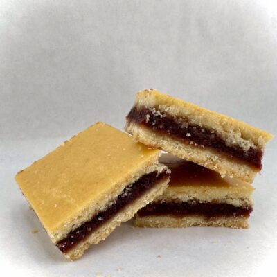 “Baked & Wired dessert bar featuring fig filling and golden cookie layers