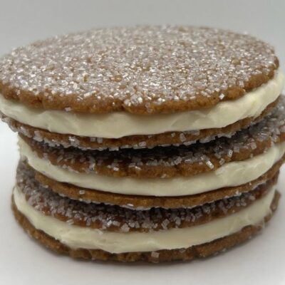 Ginger sandwich cookie with soft ginger cookies filled with lemon cream cheese frosting
